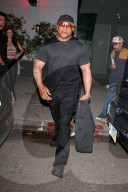 *EXCLUSIVE* LL Cool J Flexes Fashion Muscle in All-Black Attire Exiting Mark Birnbaum and Tori Praver's Birthday Bash!