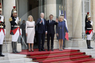 Macron hosts Bidens at Elysee Palace