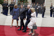 Macron hosts Bidens at Elysee Palace