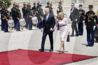 Macron hosts Bidens at Elysee Palace