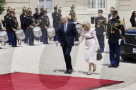 Macron hosts Bidens at Elysee Palace