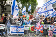 Enough Is Enough Pro Israeli counter protest facing a pro Palestine march through central London, UK.