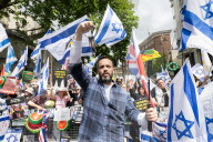 Enough Is Enough Pro Israeli counter protest facing a pro Palestine march through central London, UK.