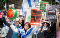 Enough Is Enough Pro Israeli counter protest facing a pro Palestine march through central London, UK.