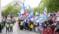 Enough Is Enough Pro Israeli counter protest facing a pro Palestine march through central London, UK.