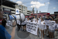 Climate Change Activists Are Protesting Outside The National Park During The Annual Congressional Baseball Game In Washington DC, USA