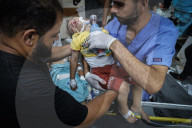 June 13, 2024, Gaza, Deir al-Balah, Palestinian Territories: 3 martyrs and a number of injuries arrived at Al-Aqsa Martyrs Hospital as a result of an Israeli bombing that targeted an apartment for the Al-Louh family in the Al-Hasaniyah area in the Nuseira