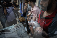 June 13, 2024, Gaza, Deir al-Balah, Palestinian Territories: 3 martyrs and a number of injuries arrived at Al-Aqsa Martyrs Hospital as a result of an Israeli bombing that targeted an apartment for the Al-Louh family in the Al-Hasaniyah area in the Nuseira