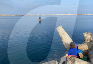 Gazans fish for food