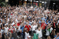 Fans watch Serbia v England in London, UK.