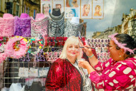 Taylor Swift fans and street sellers in Cardiff city centre