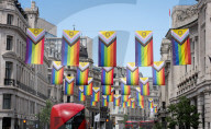 100 Intersex-Inclusive Pride flags designed by Valentino Vecchietti installed above Regent Street , London, UK. 