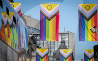 100 Intersex-Inclusive Pride flags designed by Valentino Vecchietti installed above Regent Street , London, UK. 