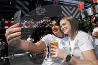 Fans watch Denmark v England at BOXPARK Croydon, UK.