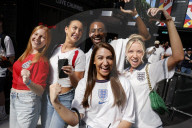 Fans watch Denmark v England at BOXPARK Croydon, UK.