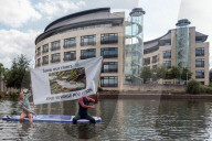 'Surfers Against Sewage' stage protest on the River Thames
