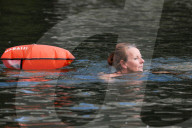 'Surfers Against Sewage' stage protest on the River Thames
