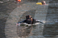 'Surfers Against Sewage' stage protest on the River Thames