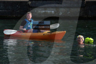 'Surfers Against Sewage' stage protest on the River Thames
