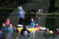 'Surfers Against Sewage' stage protest on the River Thames
