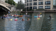 'Surfers Against Sewage' stage protest on the River Thames