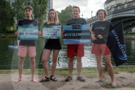 'Surfers Against Sewage' stage protest on the River Thames