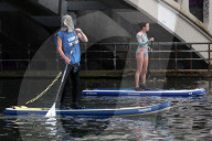 'Surfers Against Sewage' stage protest on the River Thames