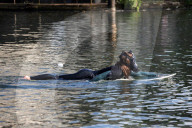 'Surfers Against Sewage' stage protest on the River Thames