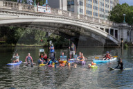 'Surfers Against Sewage' stage protest on the River Thames