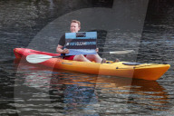 'Surfers Against Sewage' stage protest on the River Thames