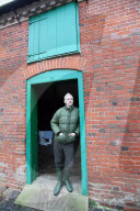 Julian Assange helps on the farm