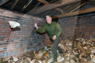 Julian Assange helps on the farm