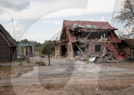 Under a drone-filled sky, Ukraine tries to retake a town, one house at a time