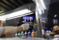 CNN Presidential Election Debate Seen on Screens in Times Square, New York, United States - 27 Jun 2024