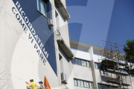 Roma, murales di Laika  che ritrae Michela Murgia sulla facciata del V Municipio