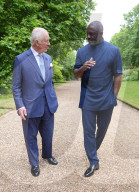 King Charles and Idris Elba with England football shirts