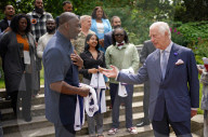 King Charles and Idris Elba with England football shirts