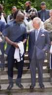 King Charles and Idris Elba with England football shirts
