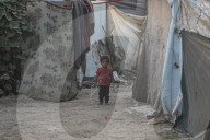 Palestinian families taking refuge in Deir al-Balah tent camp