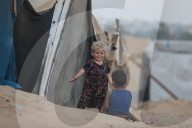 Palestinian families taking refuge in Deir al-Balah tent camp