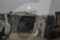 Palestinian families taking refuge in Deir al-Balah tent camp
