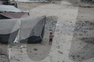 Palestinian families taking refuge in Deir al-Balah tent camp