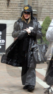 UK AND NORTH AMERICAN USE ONLY: Madonna bundles up and enjoys a cup of hot Starbucks java as she heads out of her New York home on this chilly morning