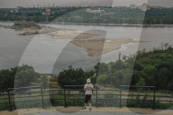 Life returns to Ukrainian reservoir drained by Russian strike on dam