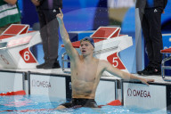 Leon Marchand gets Paris jumping by storming to medley gold
