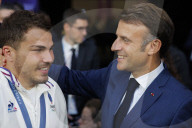 Antoine Dupont and French President Emmanuel Macron celebrate France's victory