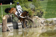 Laura Collett of Team Great Britain competes during the Equestrian Eventing Individual Cross Country leg