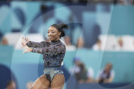 Simone Biles returns to Olympics as the circus screams on around her