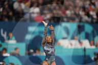 Simone Biles returns to Olympics as the circus screams on around her