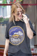 Excl - Singer Ellie Goulding is seen basking in the summer heat 